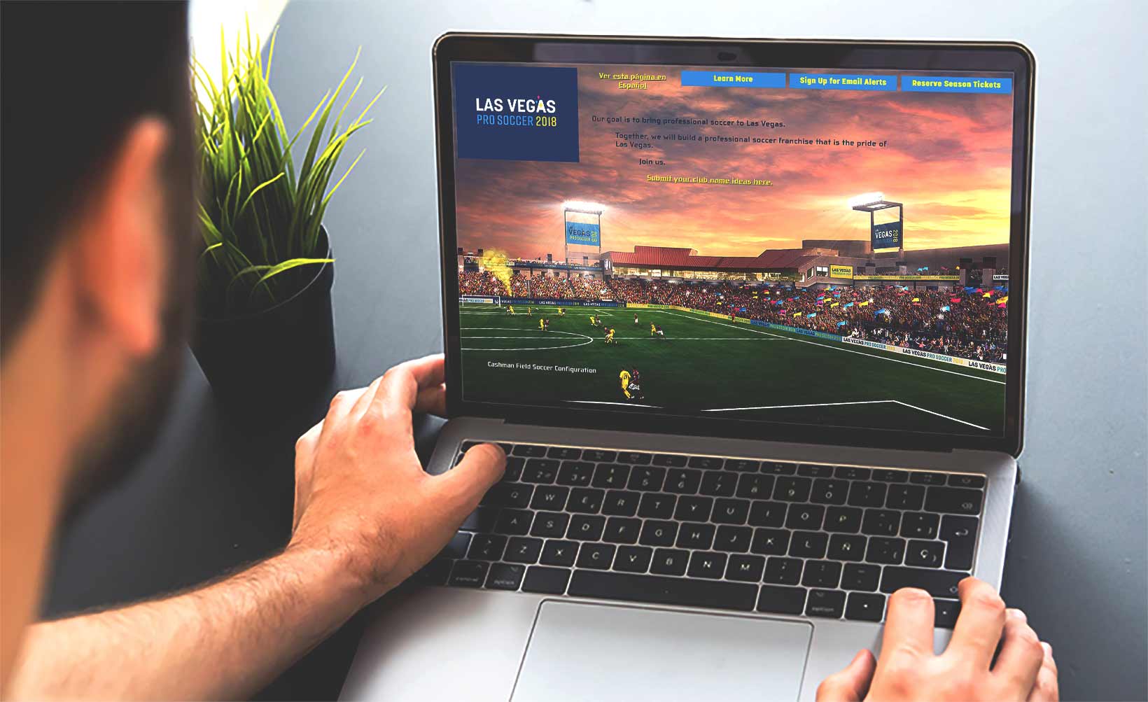 Sports fan looking at Las Vegas Pro Soccer 2018's website on a laptop